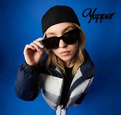 Ultra-wide fisheye portrait with cap and puffer jacket