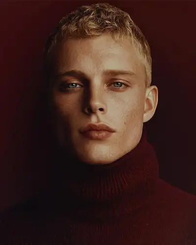 Studio Portrait of Young Man in Burgundy