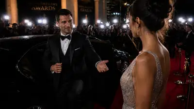 Red carpet couple exiting luxury car scene