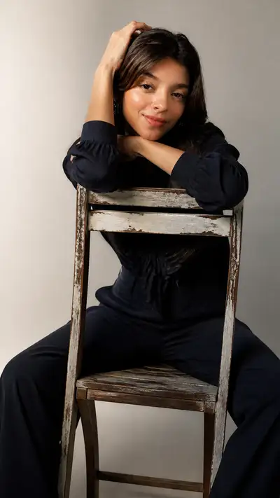 Restrained Studio Fashion Portrait with Chair Composition