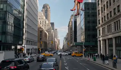 Giant Woman Pinching Man in City Street