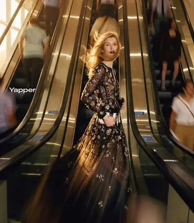 Motion-blur fashion photo between mall escalators