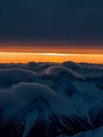 Sunrise Over Snow-Capped Mountains Time-Lapse