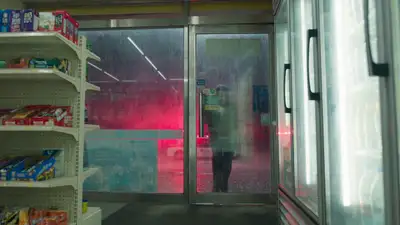 Rainy Gas-Station Thriller Film Prompt