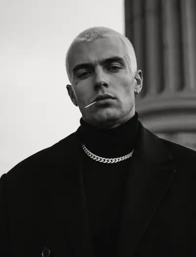 Monochrome Male Portrait With Tattoo and Necklace