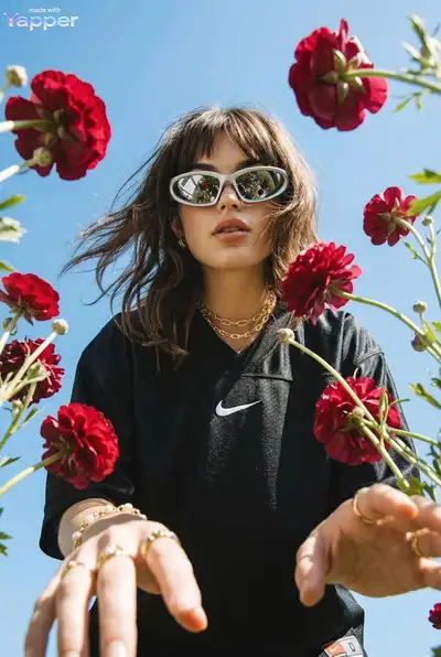 Low-Angle Fashion Editorial with Red Ranunculus