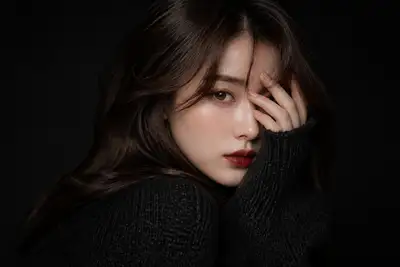 Ultra realistic studio beauty portrait in oversized black knit sweater