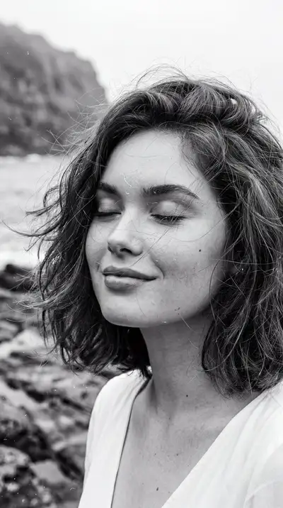 Identity-preserving windswept coastal portrait on film