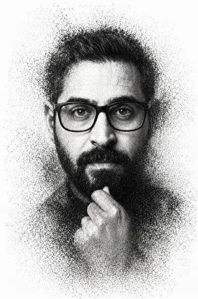 Stipple pointillism portrait of a bearded man in glasses