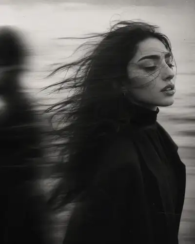 Emotional Black-and-White Portrait with Layered Focus