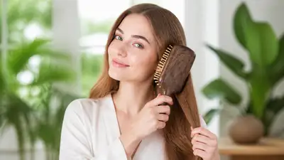 Hair brush product demo with European model, green background