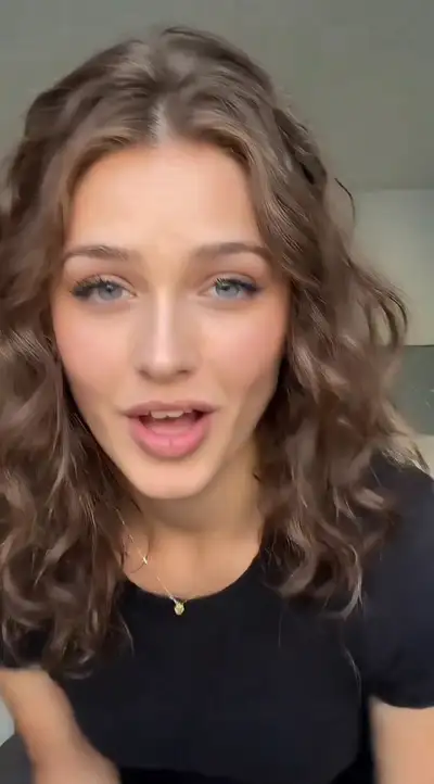Cinematic Portrait of Young Woman with Curly Hair