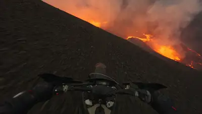 POV Motocross Through Erupting Volcano