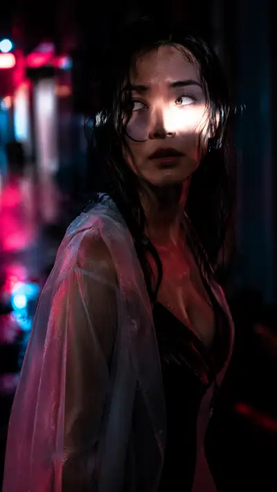 Urban noir portrait with neon reflections in the rain