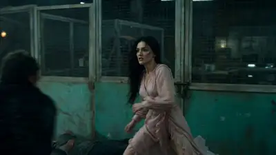 Cinematic fight sequence with pink dress contrast