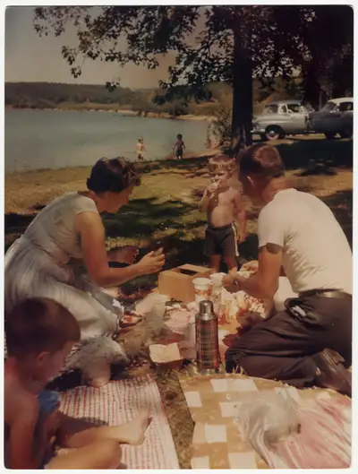 1950s family picnic by the lake vintage photo