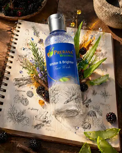 Sketch to reality face wash bottle emerging from a notebook