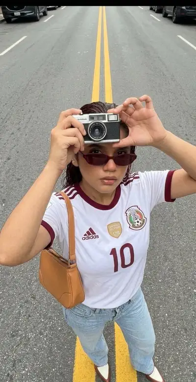 High-Angle Street Selfie with Soccer Jersey