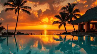 Tropical luxury resort sunset with mirrored infinity pool