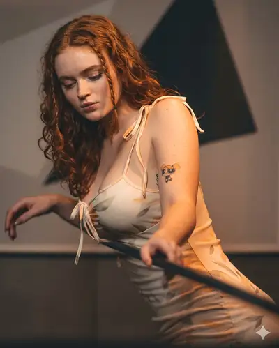 Red-haired woman with braids in modern interior