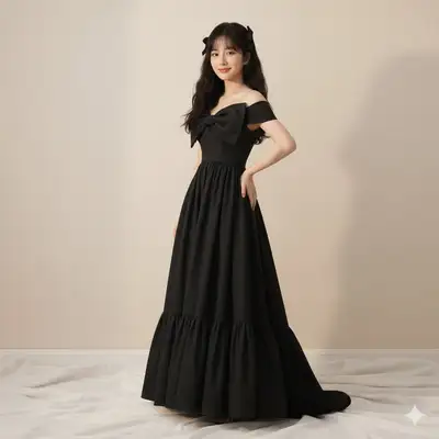 Dark romance editorial portrait in a black off-shoulder gown
