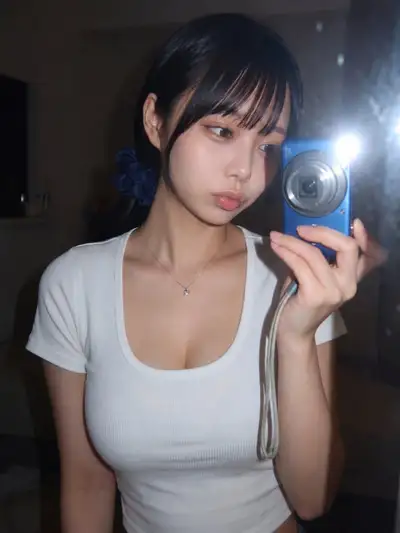 Ultra-Realistic Mirror Selfie of Young Woman