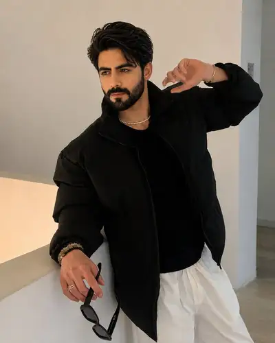 Photorealistic Fashion Portrait: South Asian Man in Black