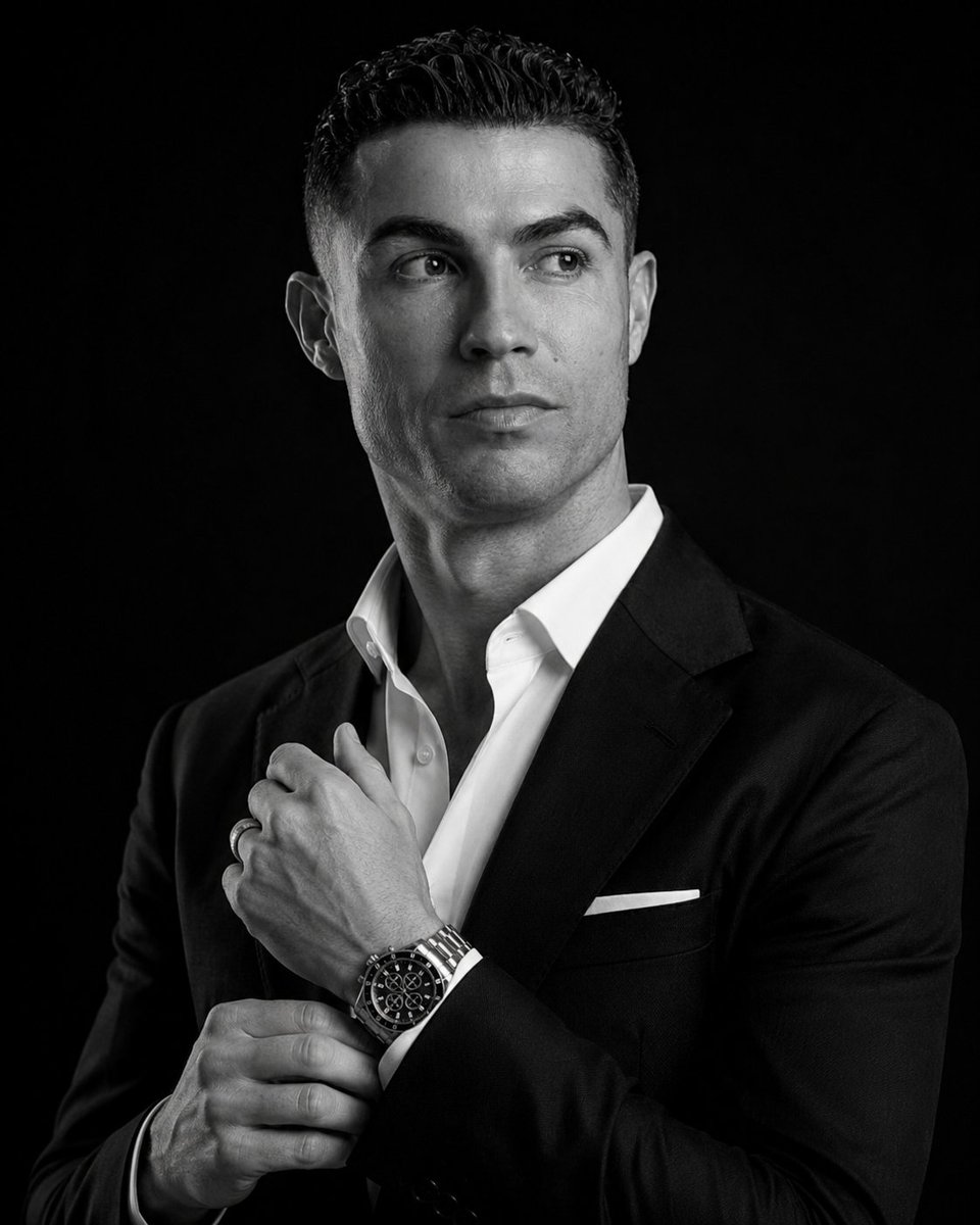 8K cinematic B&W portrait of a man in suit with luxury chronograph