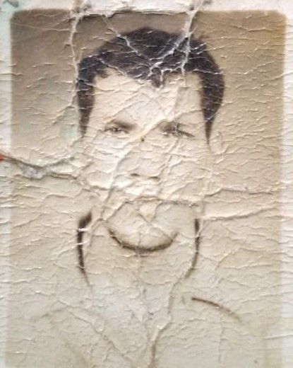 Restore a vintage portrait photo with natural color