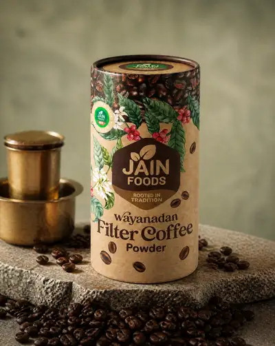 Luxury coffee tube packaging on a stone slab with roasted beans