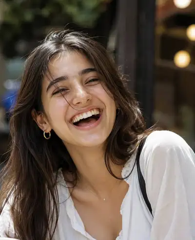 Candid portrait of joyful woman in warm light