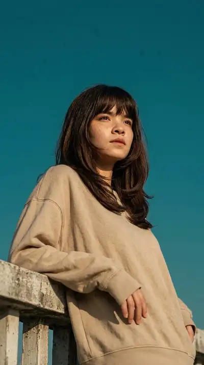 Cinematic Portrait of Woman on Concrete Railing