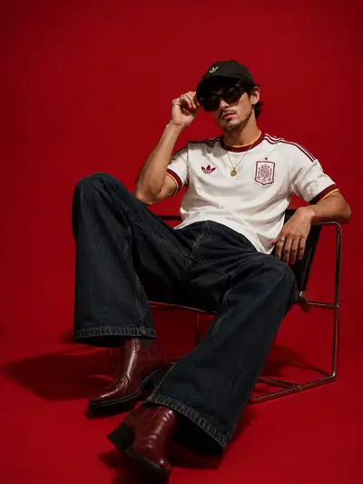 Luxury Fashion Editorial Portrait of Stylish Man in Red Studio