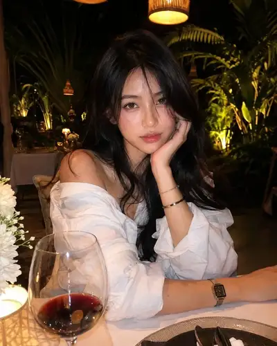 Photorealistic Candid iPhone Photo of Woman at Luxury Restaurant