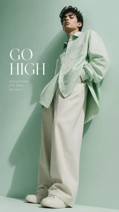 Mint-green overshirt portrait with side low-angle camera