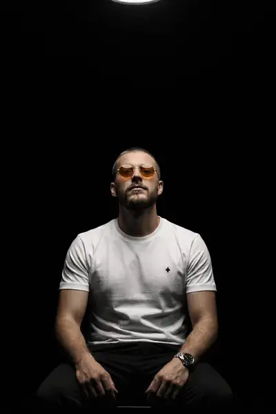 Cinematic Portrait with Overhead Spotlight