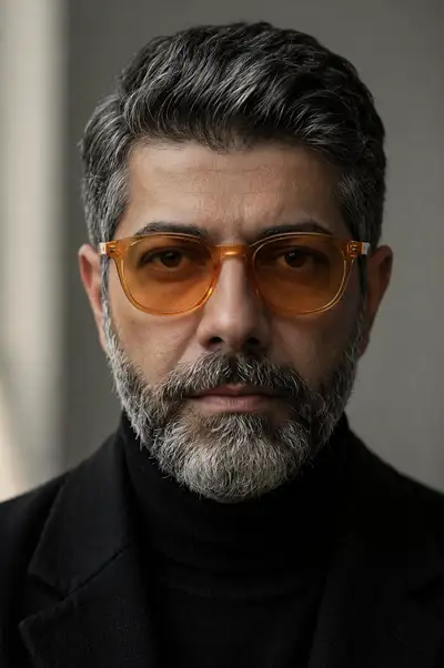 Middle-aged man portrait with amber tinted glasses
