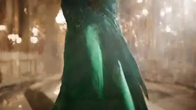 Elegant Emerald Gown Cinematic Video Prompt