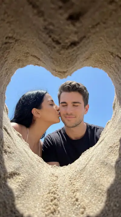 Heart-Shaped Sand Frame Beach Kiss Photo