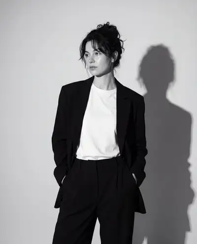 Black and White Editorial Portrait With Dramatic Shadow Silhouette