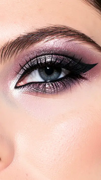 Bold metallic eye makeup close-up beauty shot
